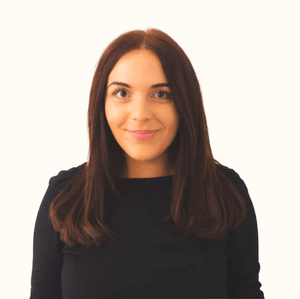 Picture of Hayley Stansfield, brown haired white woman smiling wearing a dark top